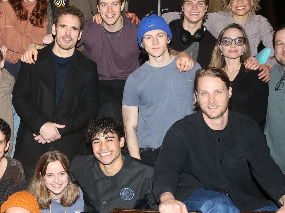 Vivienne Jolie-Pitt (bottom left), Matt Dillon (top left), and Angelina Jolie (top right) with the cast of Broadway’s The Outsiders