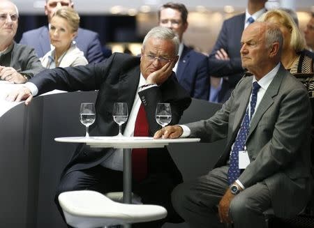 Volkswagen's CEO Martin Winterkorn (C) and Ferdinand Piech, chairman of the supervisory board (R) attend a media preview day at the Frankfurt Motor Show (IAA) in this September 10, 2013 file picture. REUTERS/Kai Pfaffenbach/Files