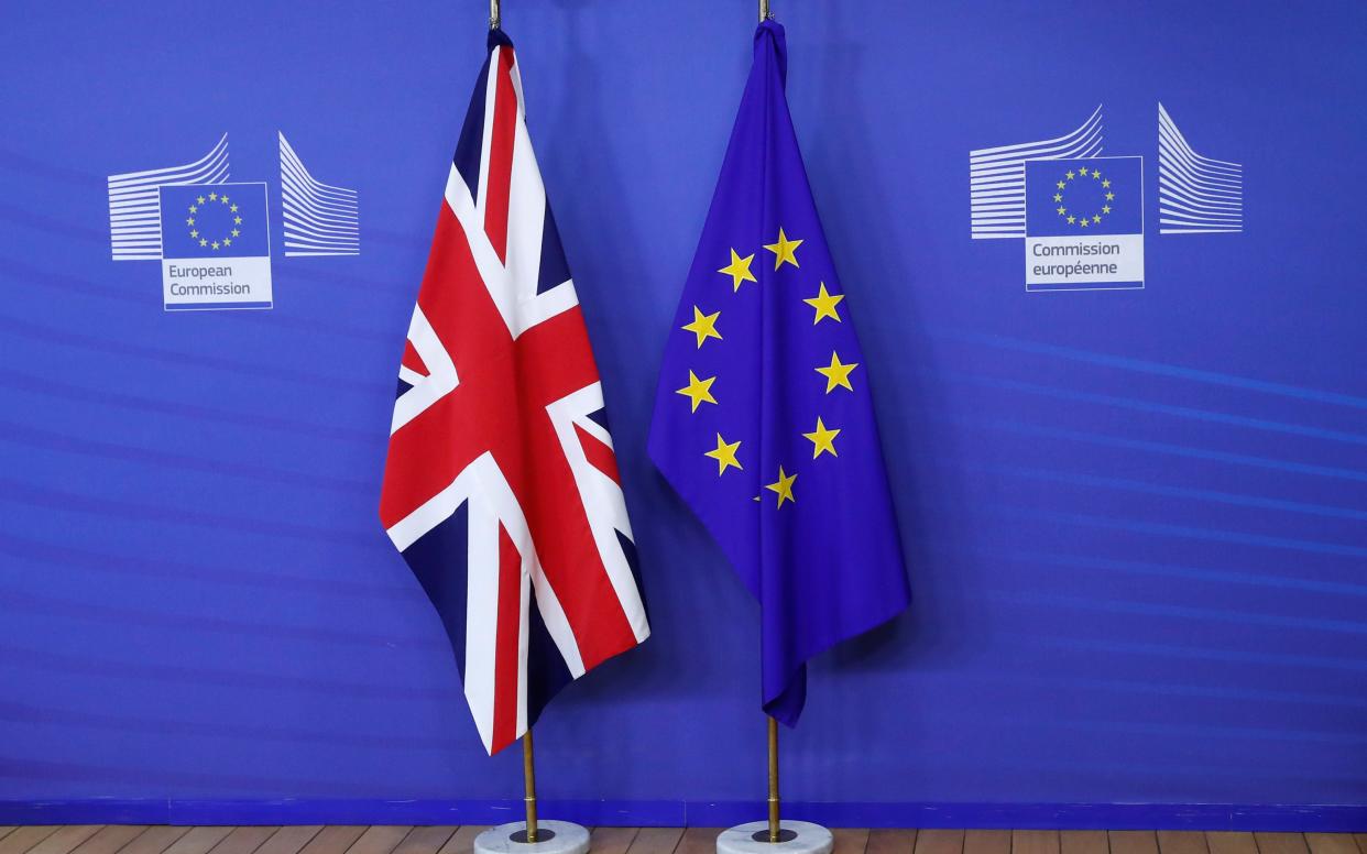Flags at the EU Commission headquarters ahead of divorce talks - Reuters