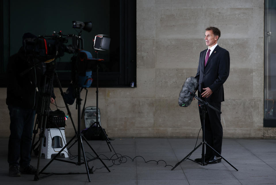 borrowing  British Chancellor of the Exchequer Jeremy Hunt talks to a television crew outside the BBC headquarters in London, Britain November 18, 2022. REUTERS/Henry Nicholls