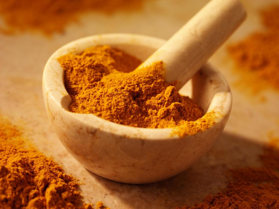 Ground turmeric powder: Rex Features