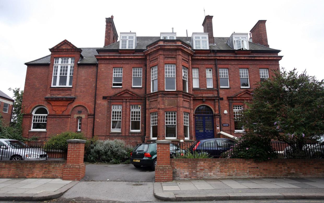 A red-brick 19th-century building