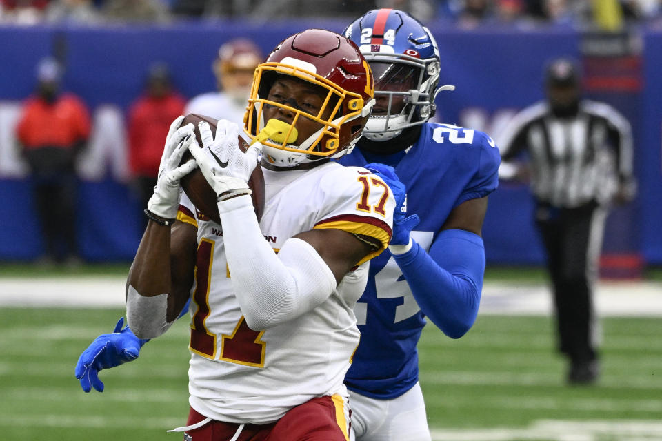 Washington Football Team wide receiver Terry McLaurin (17) catches a pass against New York Giants cornerback James Bradberry (24) during the second quarter of an NFL football game, Saturday, Jan. 9, 2021, in East Rutherford, N.J. (AP Photo/Bill Kostroun)