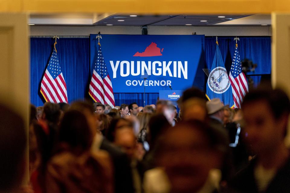 People gather the election night party for Republican gubernatorial candidate Glenn Youngkin arrives as election results come in on election night in Chantilly, Va., Tuesday, Nov. 2, 2021. (AP Photo/Andrew Harnik)