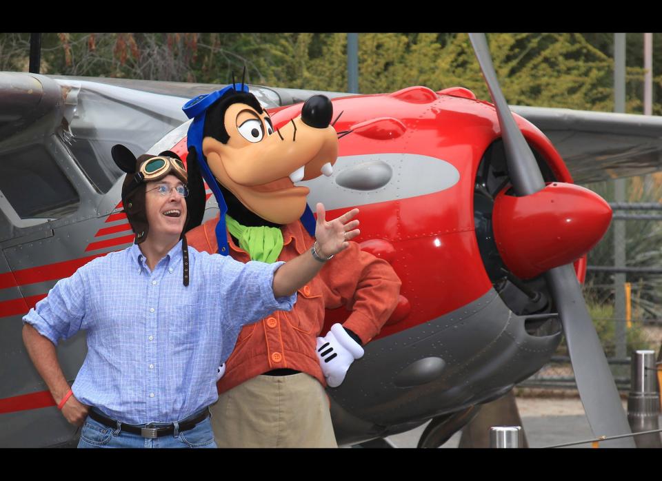 Stephen Colbert poses with Goofy outside the Soarin Over California attraction at Disney California Adventure park in on August 28, 2010 in Anaheim, California.   (Photo by Paul Hiffmeyer/Disney via Getty Images)