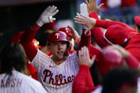 Philadelphia Phillies' Rhys Hoskins (17) celebrates after hitting a three-run home run during the third inning in Game 3 of baseball's National League Division Series against the Atlanta Braves, Friday, Oct. 14, 2022, in Philadelphia. (AP Photo/Matt Rourke)