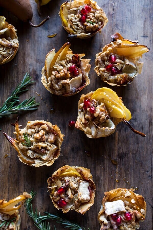 <strong>Get the <a href="http://www.halfbakedharvest.com/crispy-prosciutto-baked-brie-bites-with-honey-pears-walnuts/" target="_blank">Crispy Prosciutto Baked Brie Cups with Honeyed Pears recipe</a> from Half Baked Harvest</strong>