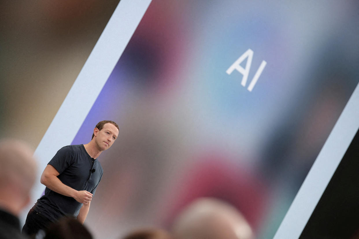 FILE PHOTO: Meta CEO Mark Zuckerberg delivers a speech, as the letters AI for artificial intelligence appear on screen, at the Meta Connect event at the company's headquarters in Menlo Park, California, U.S., September 27, 2023. REUTERS/Carlos Barria/File Photo