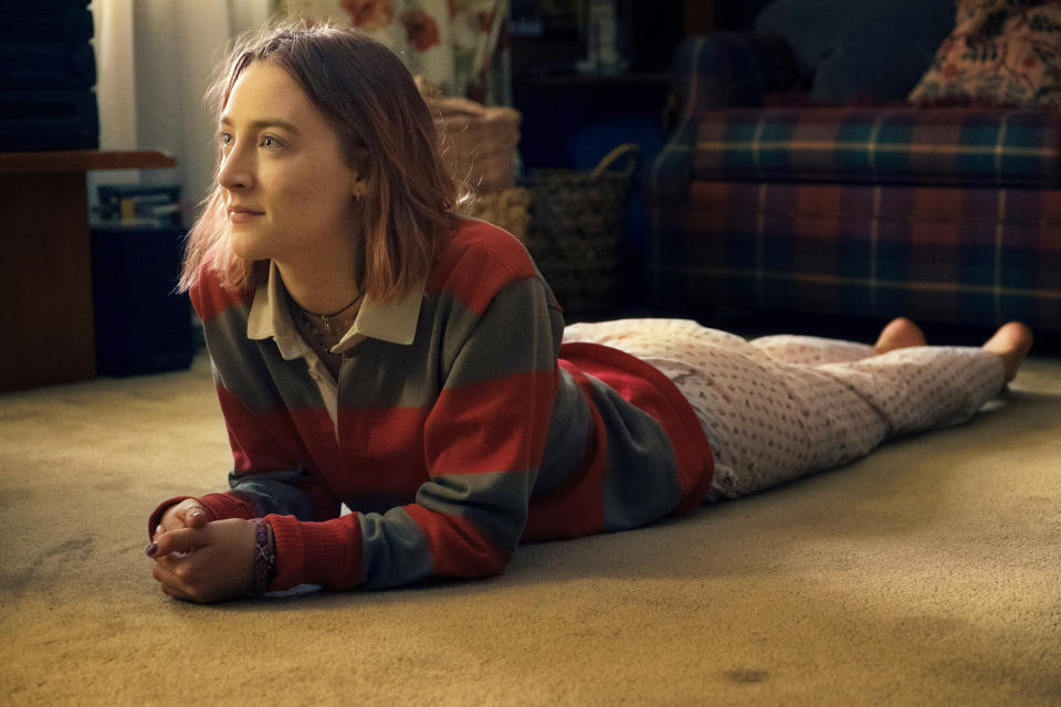 Saoirse Ronan lying on the floor.