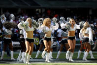 <p>Oakland Raiders cheerleaders dance during the first half against the New England Patriots at Estadio Azteca on November 19, 2017 in Mexico City, Mexico. (Photo by Buda Mendes/Getty Images) </p>