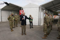 President Joe Biden speaks at a FEMA COVID-19 mass vaccination site at NRG Stadium, Friday, Feb. 26, 2021, in Houston. (AP Photo/Patrick Semansky)