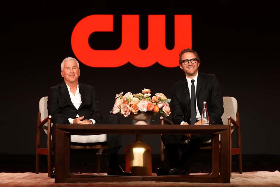 The CW president Dennis Miller (l.) and head of programming Brad Schwartz speak to writers at the TCA Winter Press Tour in February.