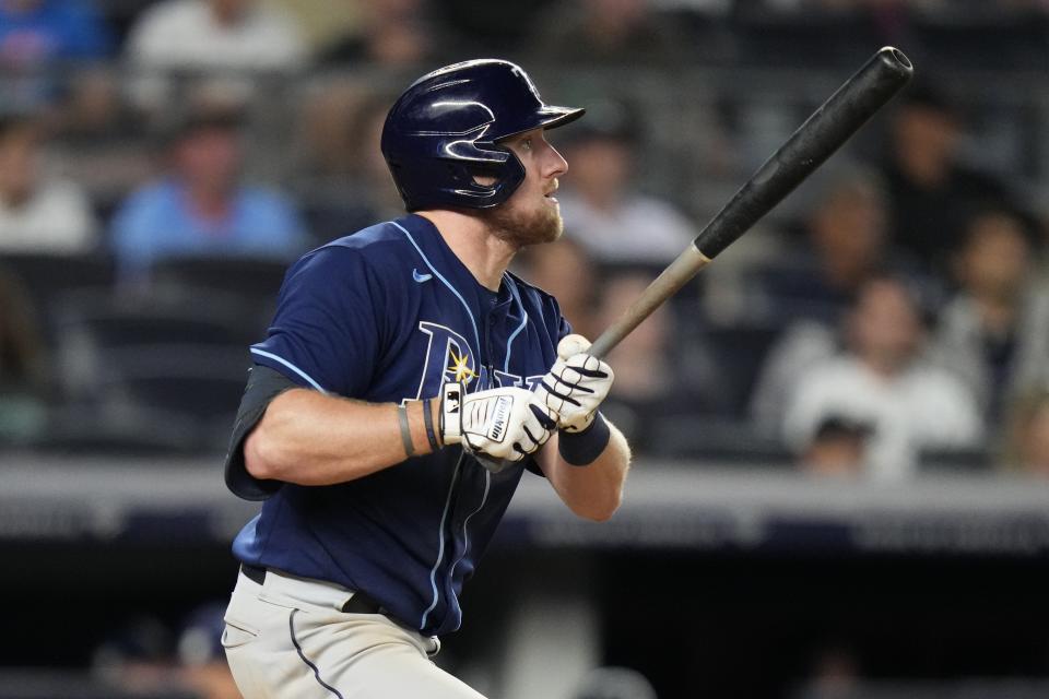 Tampa Bay Rays' Luke Raley follows through on a double during the ninth inning of a baseball game against the New York Yankees, Monday, July 31, 2023, in New York. (AP Photo/Frank Franklin II)
