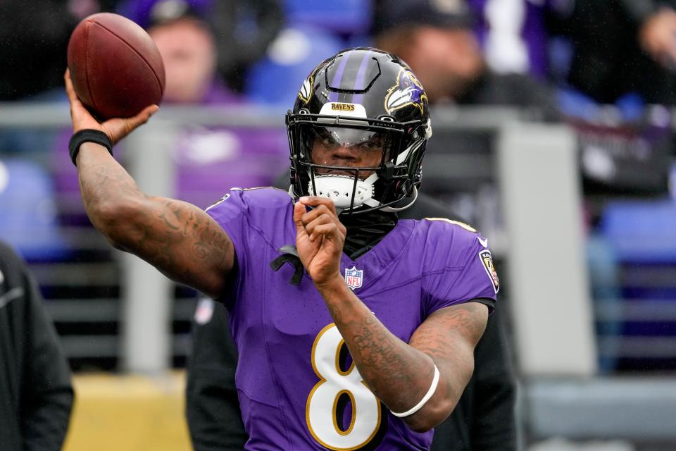Baltimore Ravens quarterback Lamar Jackson (8) warms up before the AFC Championship NFL football game against the Kansas City Chiefs, Sunday, Jan. 28, 2024, in Baltimore. (AP Photo/Nick Wass)
