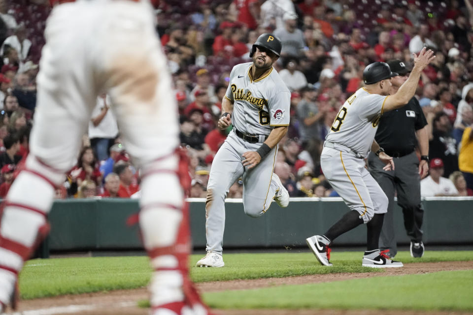 Pittsburgh Pirates' Alfonso Rivas runs toward home plate to score on a two-run double by Ji Hwan Bae during the eighth inning of a baseball game against the Cincinnati Reds, Saturday, Sept. 23, 2023, in Cincinnati. (AP Photo/Joshua A. Bickel)