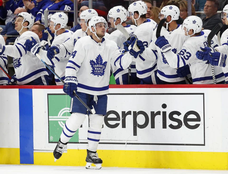 Toronto Maple Leafs center Auston Matthews (34) celebrates his goal during the second period of an NHL hockey game against the Detroit Red Wings on Thursday, Oct. 11, 2018, in Detroit. (AP Photo/Paul Sancya)