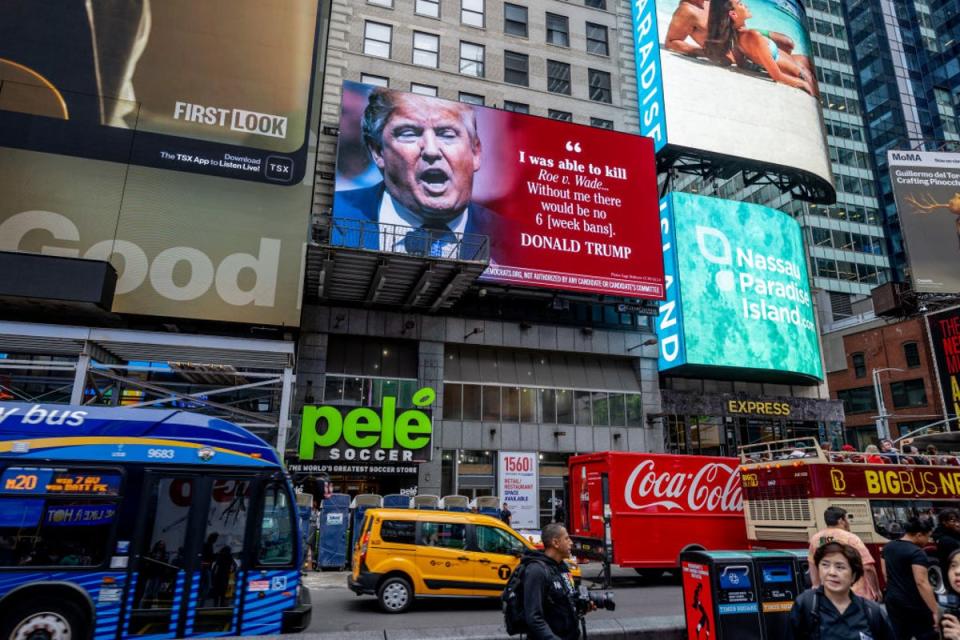 A billboard displaying Donald Trump’s boastful remarks about his responsibility for overturning Roe vs Wade is displayed in Times Square (Getty Images for DNC)