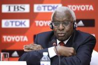 Outgoing President of International Association of Athletics Federations (IAAF) Lamine Diack attends a news conference in Beijing, August 20, 2015. REUTERS/Jason Lee