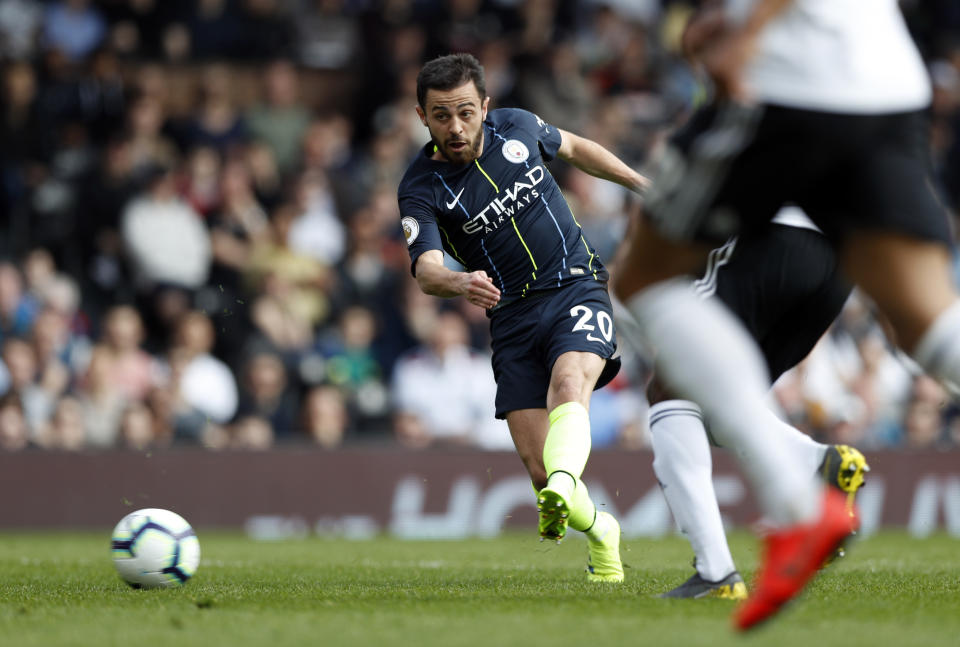 Manchester City's Bernardo Silva attempts a shot at goal during the English Premier League soccer match between Fulham and Manchester City at Craven Cottage stadium in London, Saturday, March 30, 2019. (AP Photo/Alastair Grant)