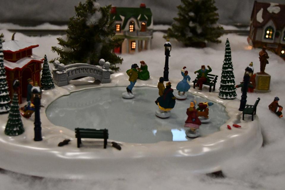 Miniature figures ice skating is part of the display at the 2022 Hayes Train Special exhibit.