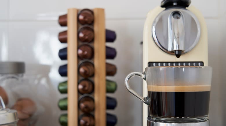 nespresso machine brewing coffee