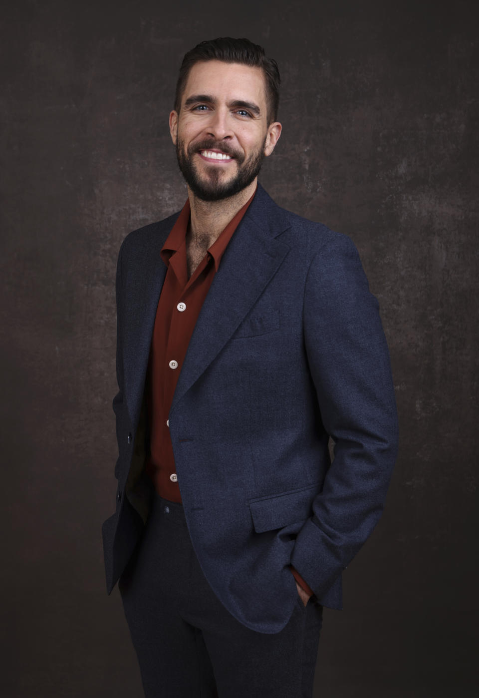 FILE - Josh Segarra, a cast member in the Apple TV+ television series "The Big Door Prize," poses for a portrait during the Winter Television Critics Association Press Tour on Wednesday, Jan. 18, 2023, at The Langham Huntington Hotel in Pasadena, Calif. (Willy Sanjuan/Invision/AP, File)