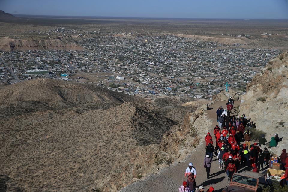 Catholics and other Christians make a pilgrimage to the summit of Mount Cristo Rey to pray in observance of Good Friday, Friday, April 7, 2023.