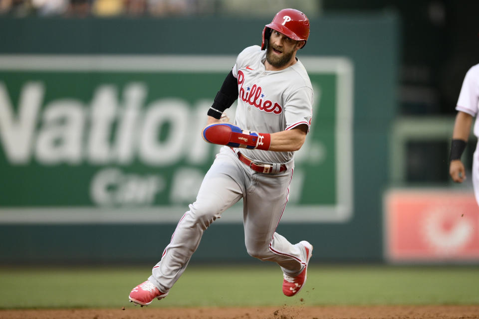 Philadelphia Phillies' Bryce Harper runs to third on a single by Nick Castellanos during the third inning of the team's baseball game against the Washington Nationals, Thursday, June 16, 2022, in Washington. (AP Photo/Nick Wass)