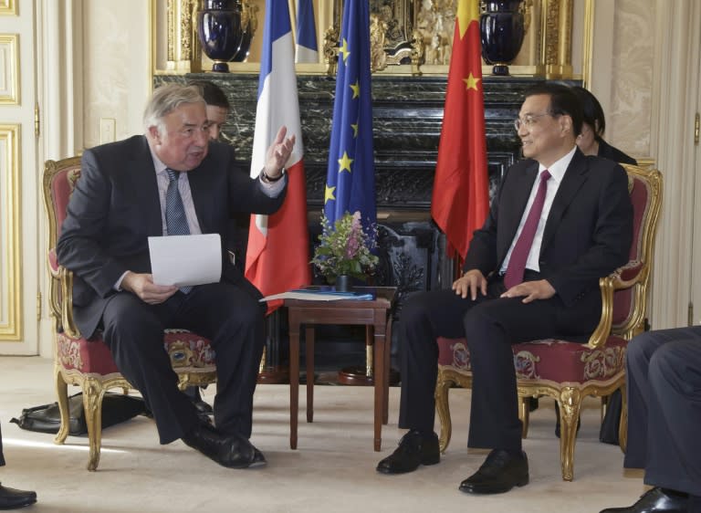 French Senate President Gerard Larcher (L) meets with China's Prime Minister Li Keqiang at the Senate in Paris on June 30, 2015