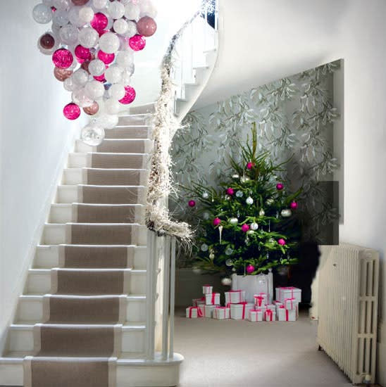 Or, if you want to go all out, create a statement-making chandelier with an arrangement of ornamentsâ€¦