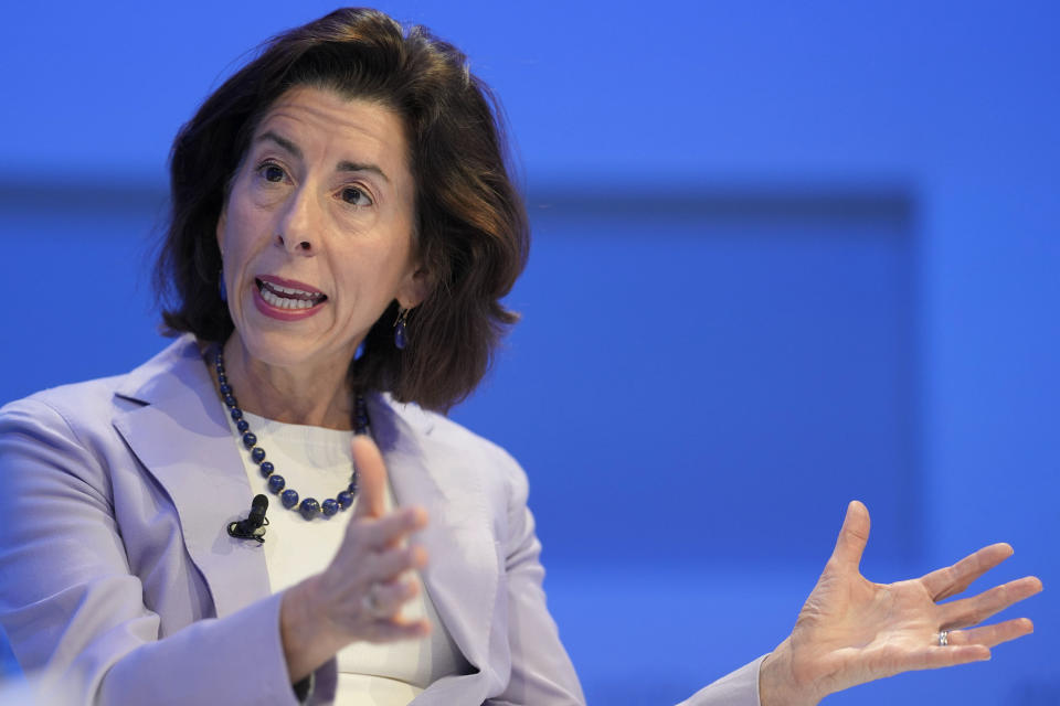 FILE - Secretary of Commerce Gina Raimondo attends a panel session at the World Economic Forum in Davos, Switzerland, May 25, 2022. (AP Photo/Markus Schreiber, File)