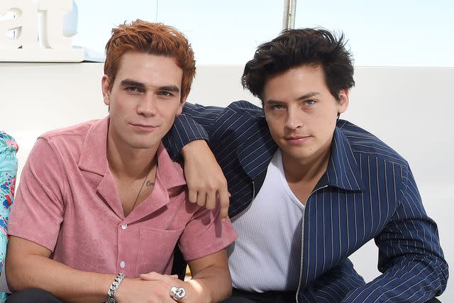 <p>Michael Kovac/Getty</p> KJ Apa and Cole Sprouse attend the #IMDboat at San Diego Comic-Con 2019: Day Three at the IMDb Yacht on July 20, 2019 in San Diego, California