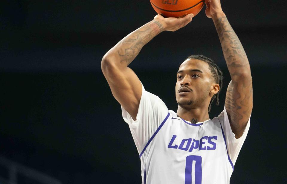 Sep 27, 2024; Phoenix, Ariz., U.S.; Grand Canyon Lopes Guard Ray Harrison (0) prepares to shoot during practice at Grand Canyon University Arena in Phoenix on Sept. 27, 2024.