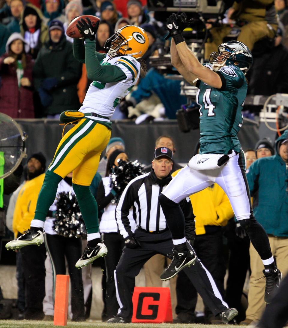 Tramon Williams intercepts the pass intended for Riley Cooper of the Philadelphia Eagles late in the fourth quarter during the NFC wild-card playoff game Jan. 9, 2011, at at Lincoln Financial Field.