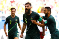 Soccer Football - World Cup - Group C - Denmark vs Australia - Samara Arena, Samara, Russia - June 21, 2018 Australia's Mile Jedinak celebrates scoring their first goal with team mates REUTERS/Michael Dalder