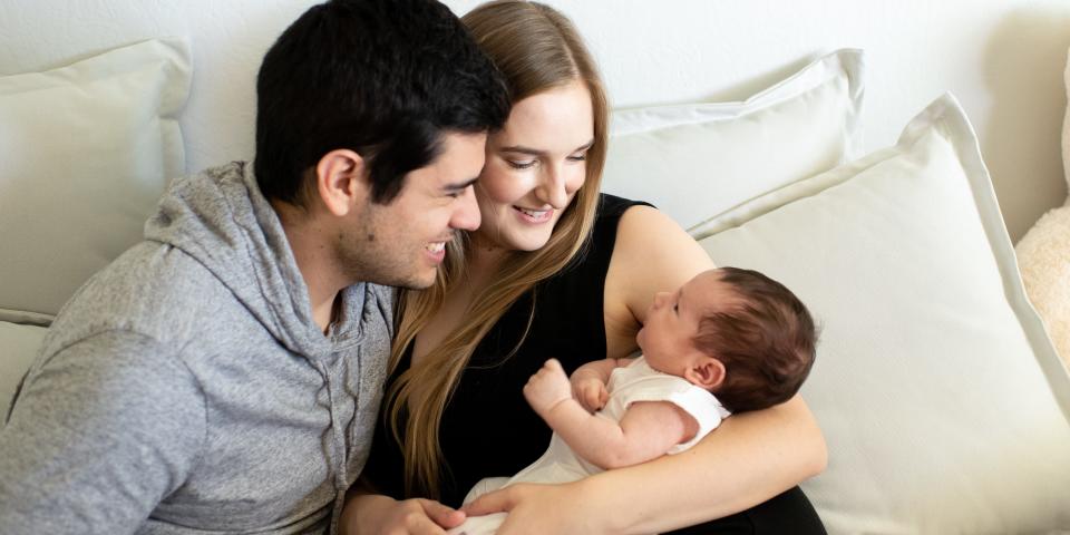 Shannon Mayor with her husband and baby.