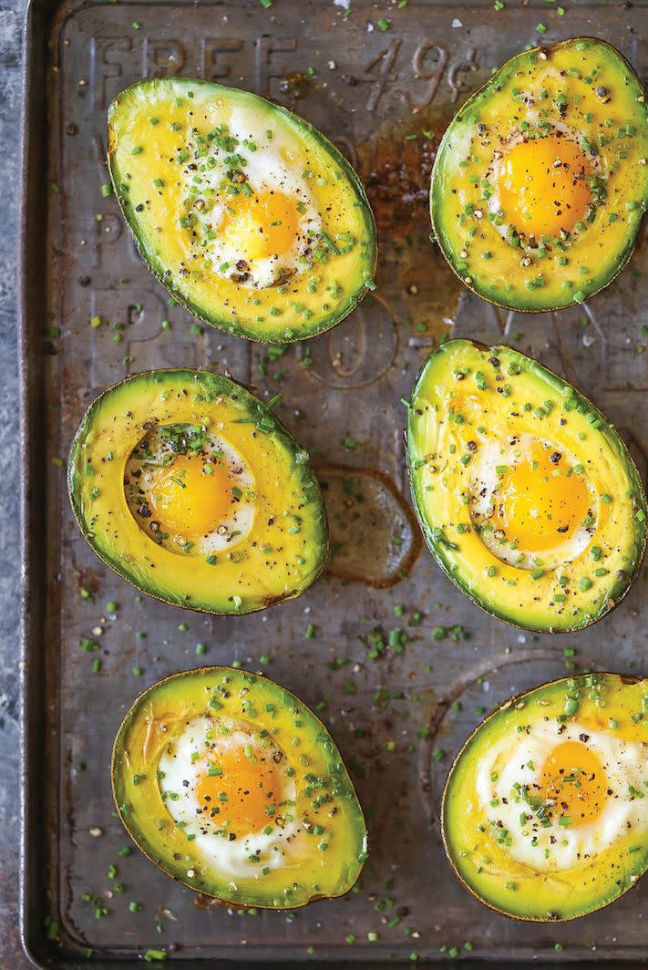 <strong>Get the <a href="https://damndelicious.net/2016/10/05/baked-eggs-in-avocado/" target="_blank">Baked Eggs In Avocado</a> recipe from Damn Delicious</strong>