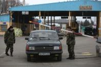 Pro-Russian separatists with the Donetsk People's Republic operate the border crossing from East Ukraine into Russia at Uspenka