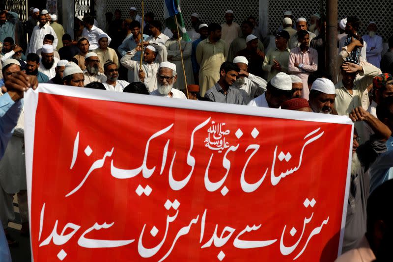 FILE PHOTO: Supporters of religious and political party Jamaat-e-Islami listen to the speech of their leader during a protest in Karachi