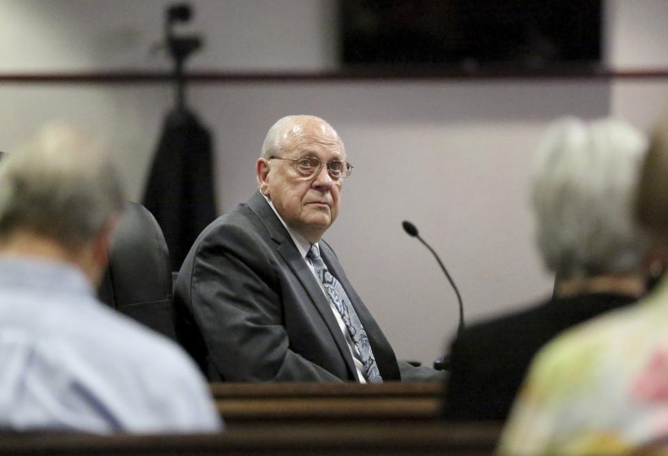 Former Tampa police captain Curtis Reeves prepares to give testimony during his second-degree murder trial on Thursday, Feb 24, 2022, at the Robert D. Sumner Judicial Center in Dade City, Fla. Reeves is accused of shooting and killing Chad Oulson at a Wesley Chapel movie theater in January 2014. (Douglas R. Clifford/Tampa Bay Times via AP, Pool)