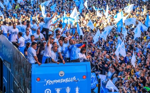 Manchester City became the first club to retain the Premier League title in a decade - Credit: PA