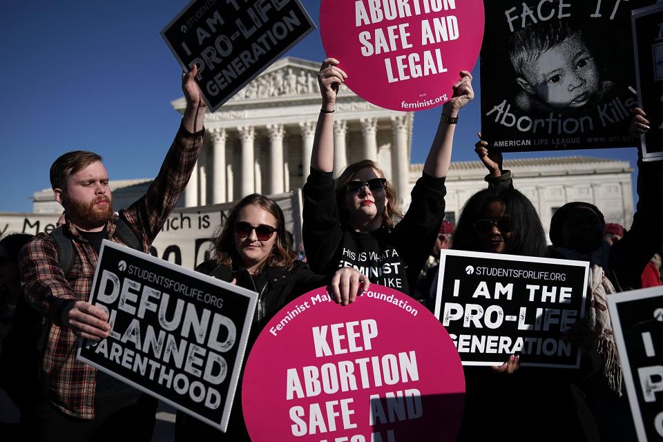 Protesters on both sides of the abortion debate gathered in 2018 to mark the anniversary of the 1973 Supreme Court ruling that legalized abortion.