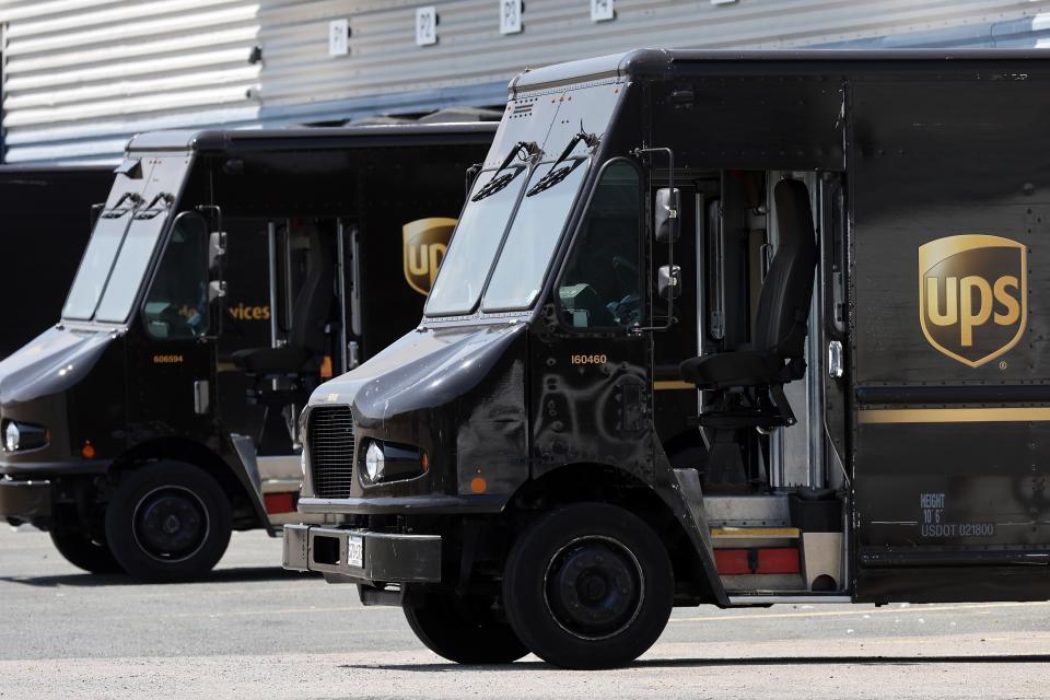 FILE- United Parcel Service trucks are seen parked at a distribution facility, Friday, June 30, 2023, in Boston. A little more than a week after contract talks between UPS and the union representing 340,000 of its workers broke down, UPS said Friday, July 14, 2023, it will begin training many of its non-union employees in the U.S. to step in should there be a strike, which the union has vowed to do if no agreement is reached by the end of this month. (AP Photo/Michael Dwyer, File)