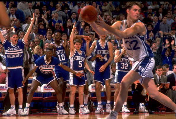 Duke's Christian Laettner (32) in action in front of Kentucky bench during game at The Spectrum. Philadelphia, PA 3/28/1992. (Getty)