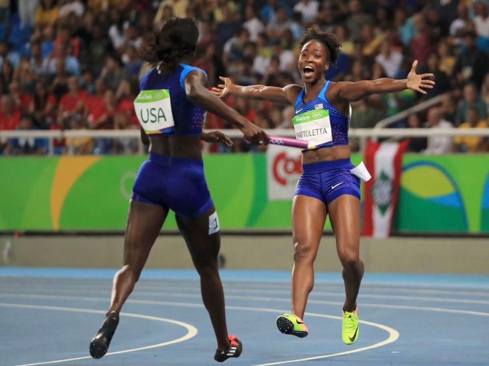 Tianna Madison (right) and Tori Bowie embrace after winning gold in Rio.