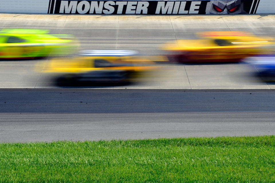 DOVER, DE - JUNE 03: Cars race during the NASCAR Sprint Cup Series FedEx 400 benefiting Autism Speaks at Dover International Speedway on June 3, 2012 in Dover, Delaware. (Photo by John Harrelson/Getty Images for NASCAR)