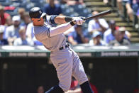 New York Yankees' Aaron Judge hits a double in the sixth inning in the first baseball game of a doubleheader against the Cleveland Guardians, Saturday, July 2, 2022, in Cleveland. (AP Photo/David Dermer)