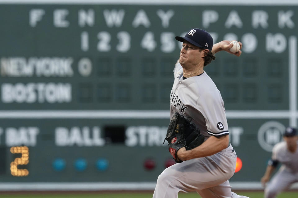 New York Yankees starting pitcher Gerrit Cole delivers to a Boston Red Sox batter during the first inning of a baseball game at Fenway Park, Friday, July 23, 2021, in Boston. (AP Photo/Elise Amendola)
