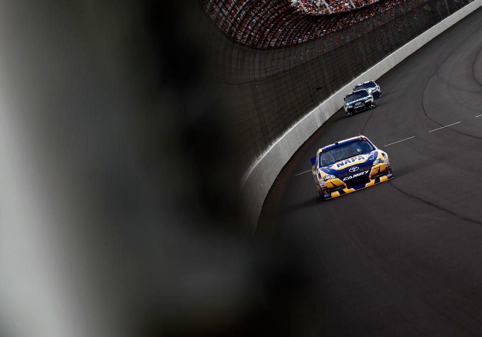 BROOKLYN, MI - JUNE 17: Martin Truex Jr., driver of the #56 NAPA Auto Parts Toyota, races during the NASCAR Sprint Cup Series Quicken Loans 400 at Michigan International Speedway on June 17, 2012 in Brooklyn, Michigan. (Photo by Jeff Zelevansky/Getty Images)