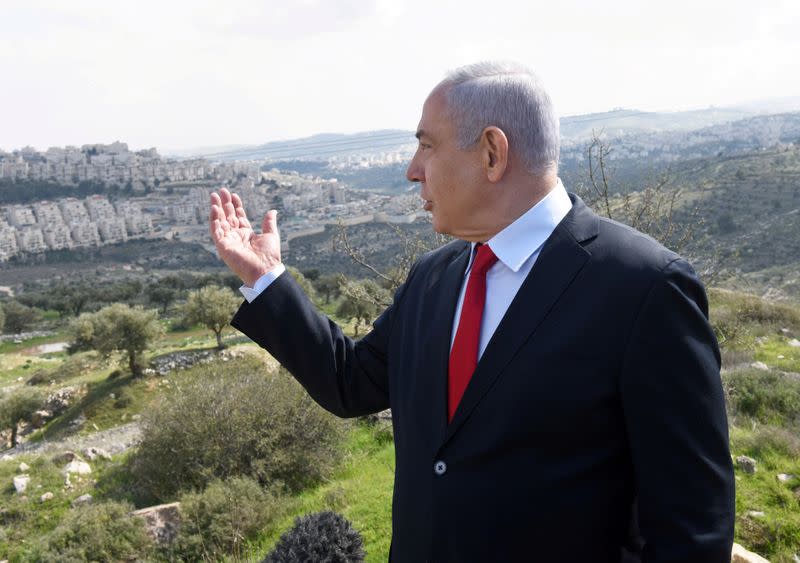 FILE PHOTO: Israeli PM Netanyahu delivers statement overlooking Israeli settlement of Har Homa